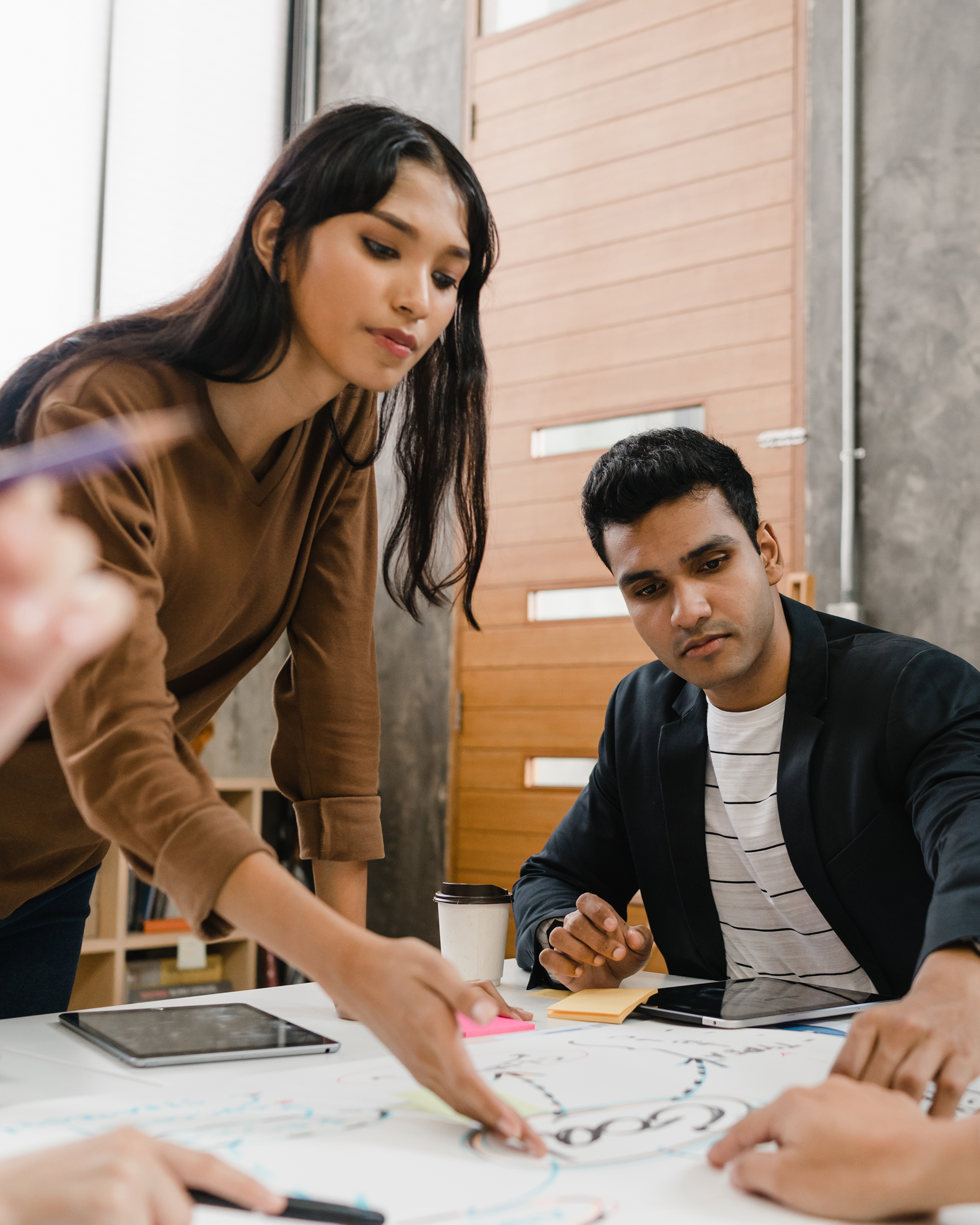 colleagues working together at conference table