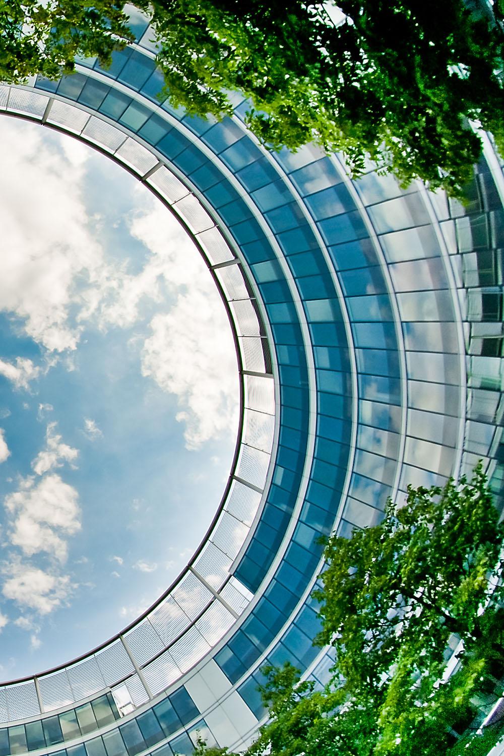 Upward view of office building to sky