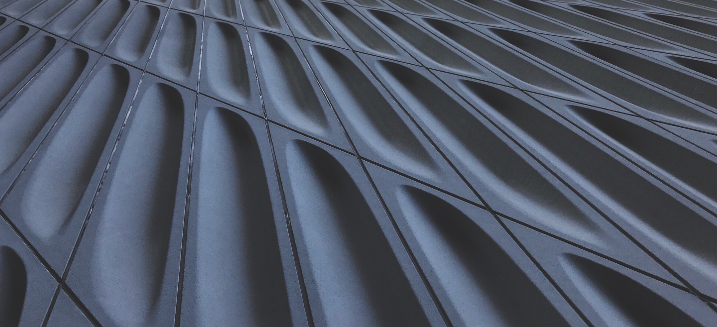 Low angle shot of textured concrete building facade