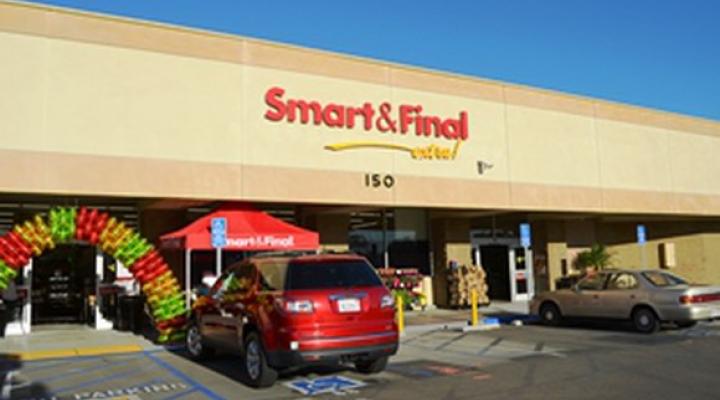 A Smart & Final store front with cars parked in front of it.