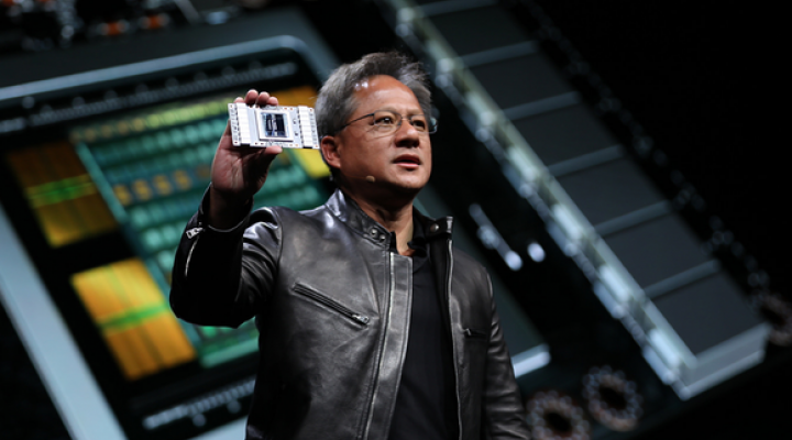 NVIDIA CEO Jensen Huang showing off the Volta GPU