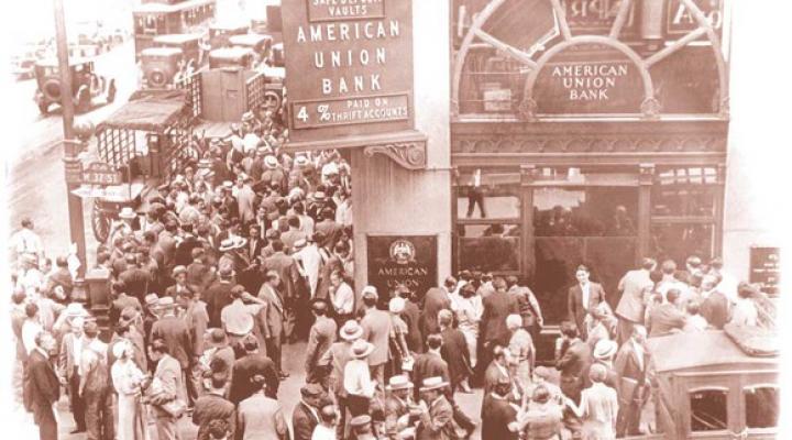 People line up outside a bank for a bank run.