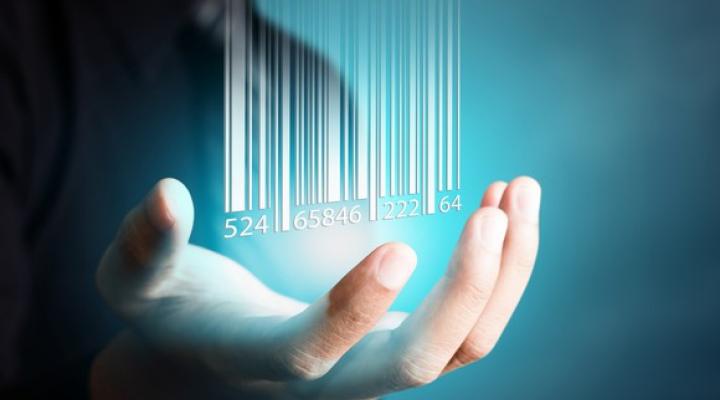 Hand grasping digital representation of barcode