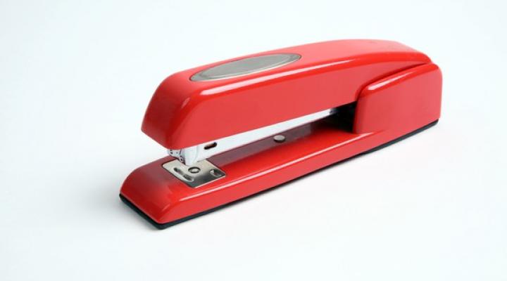 Red stapler in the style of ACCO's Swingline brand.