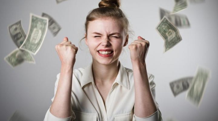 Money raining down on woman