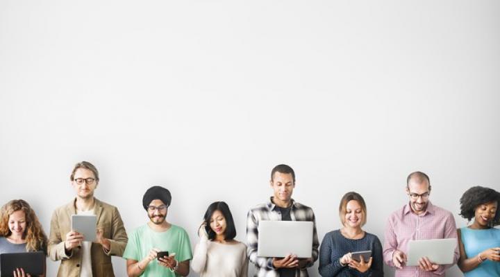 Group of people using mobile devices