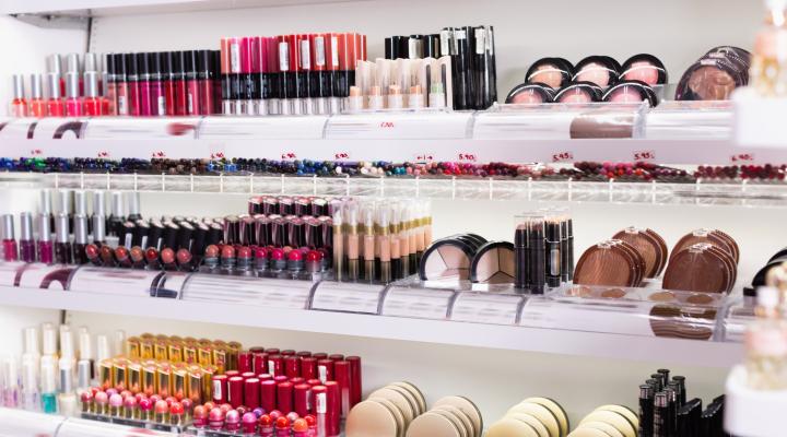 Makeup display with lipstick and accessories.