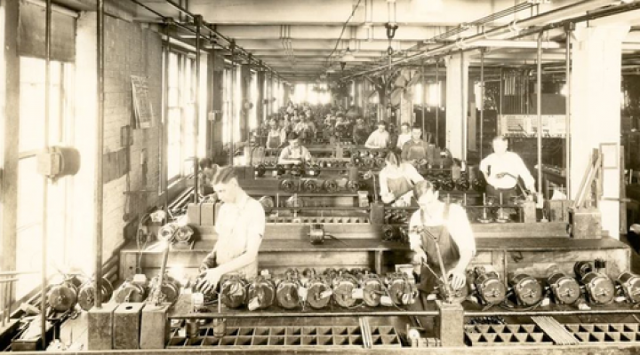 historical pic of men working in manufacturing at an Emerson Electric plant