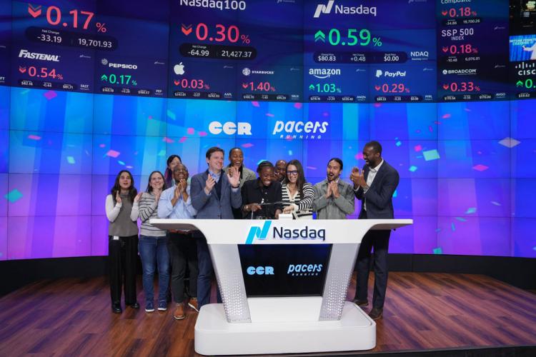 Chocolate City Relay and Pacers Running rings the Nasdaq stock market closing bell on December 5, 2024.